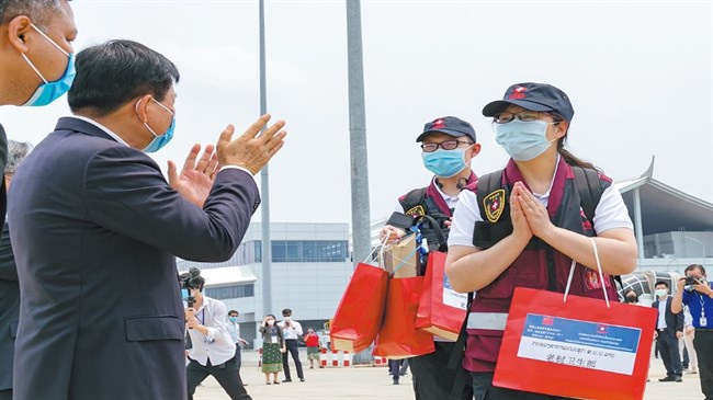 Following Xi Jinping Thought on Diplomacy to build a community with a shared future for mankind through international cooperation against COVID-19