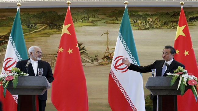 China, Iran vow joint effort against unilateralism, bullying